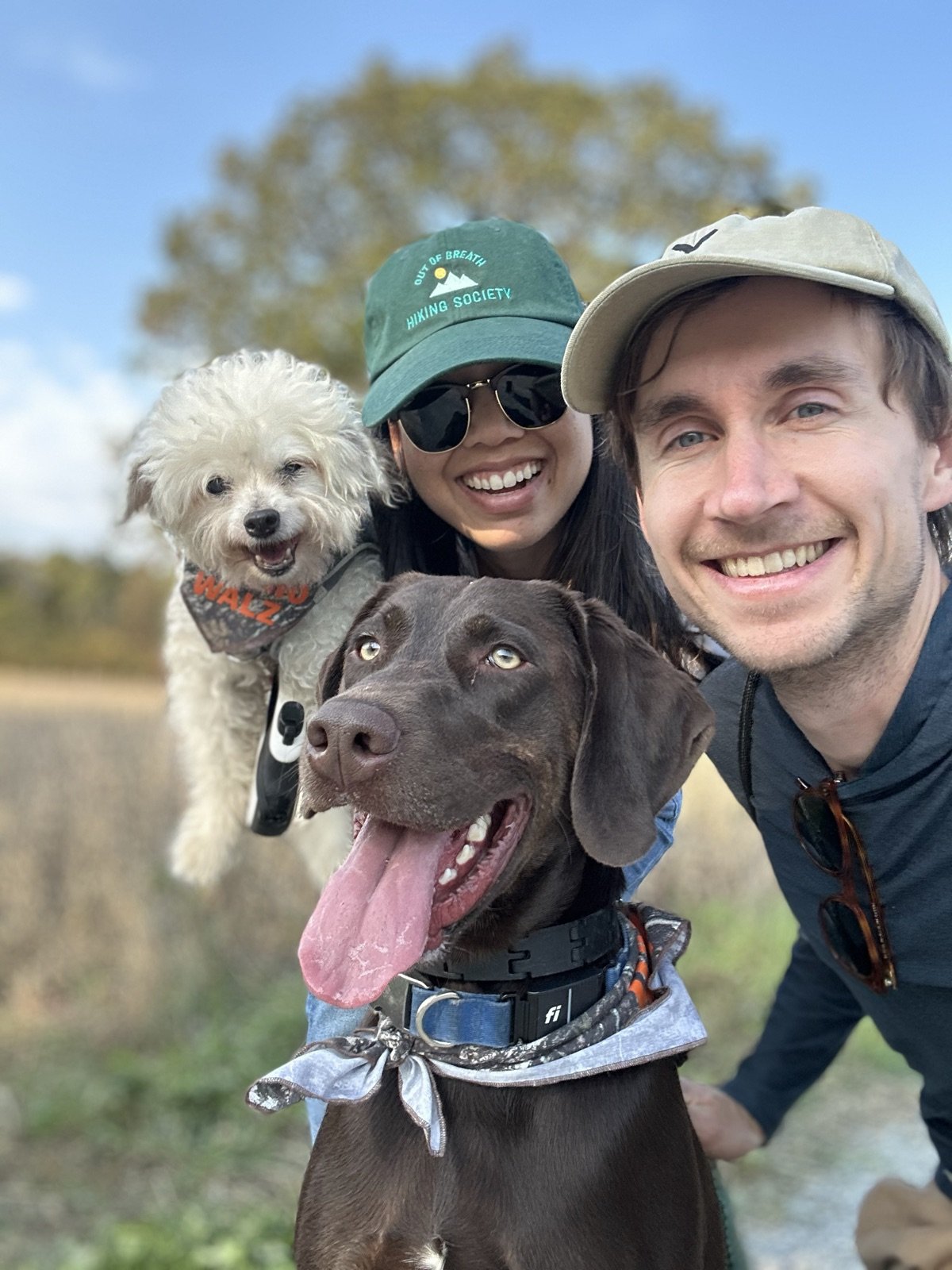 Michie & Charlie with both dogs on an autumn hike